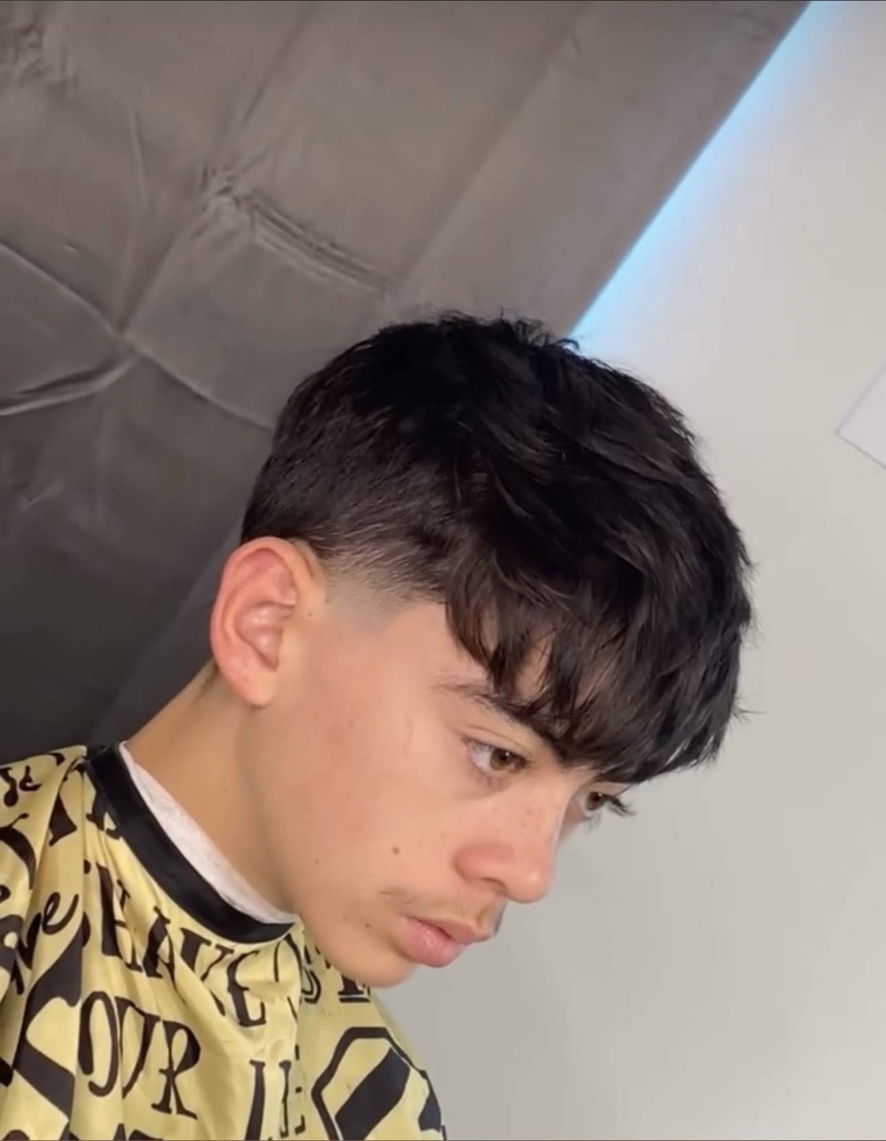 Messy crop with a clean mid taper fade