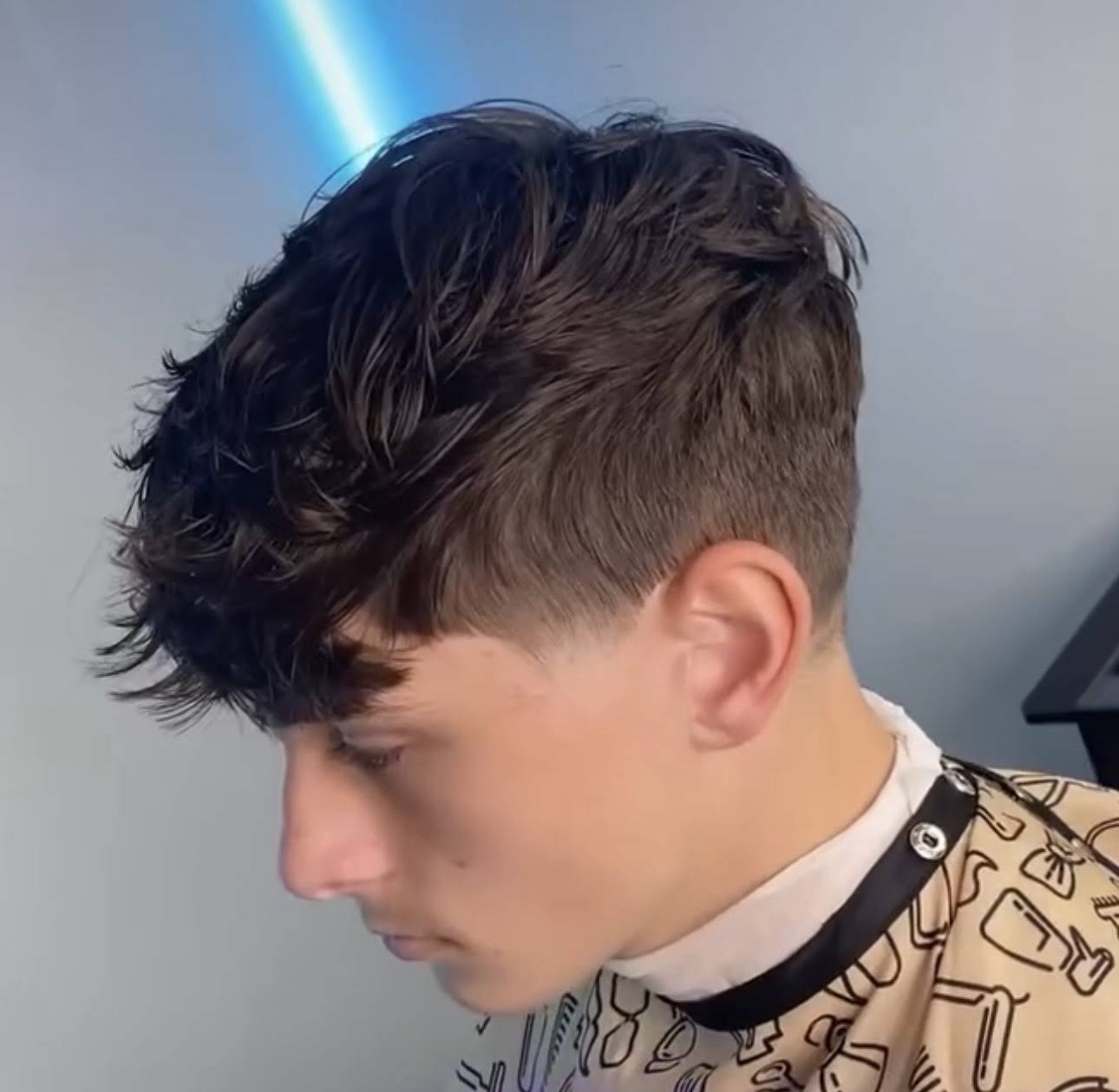 Textured fringe with a low taper fade