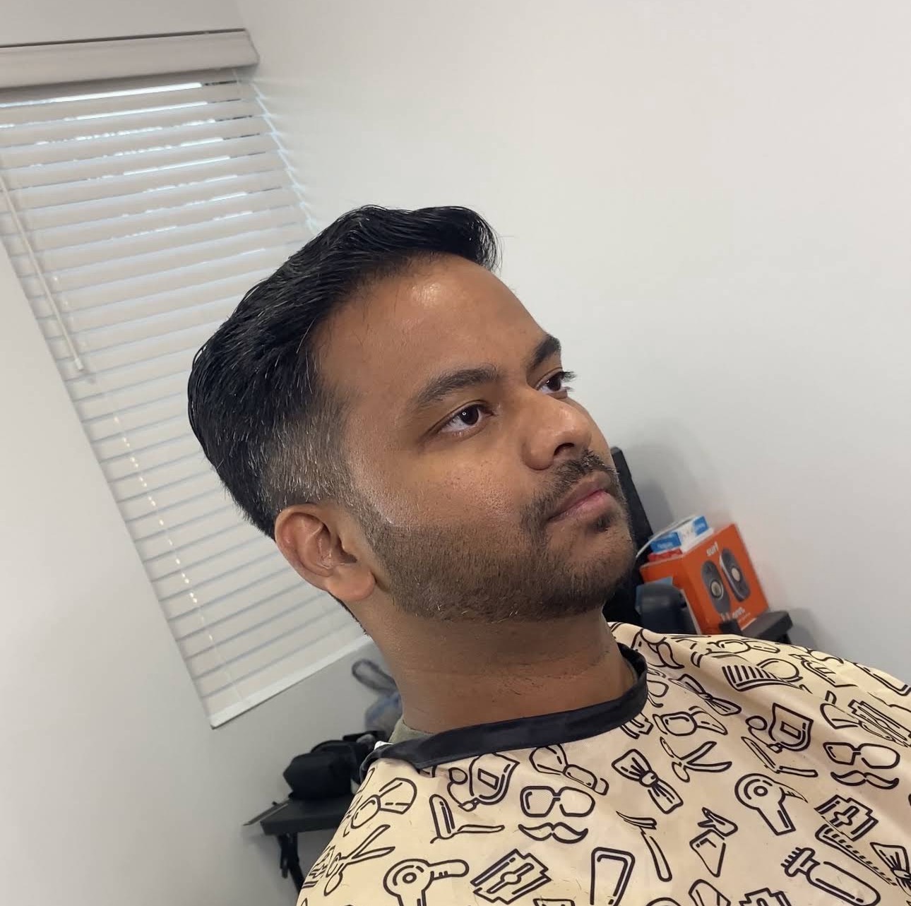 Classic side part with a beard line-up